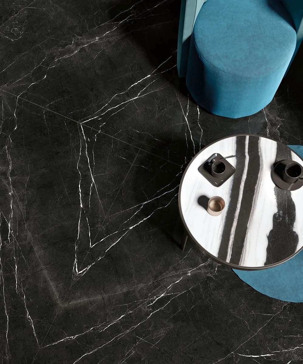 Nero Marquinia installed — large-format marble-effect surface